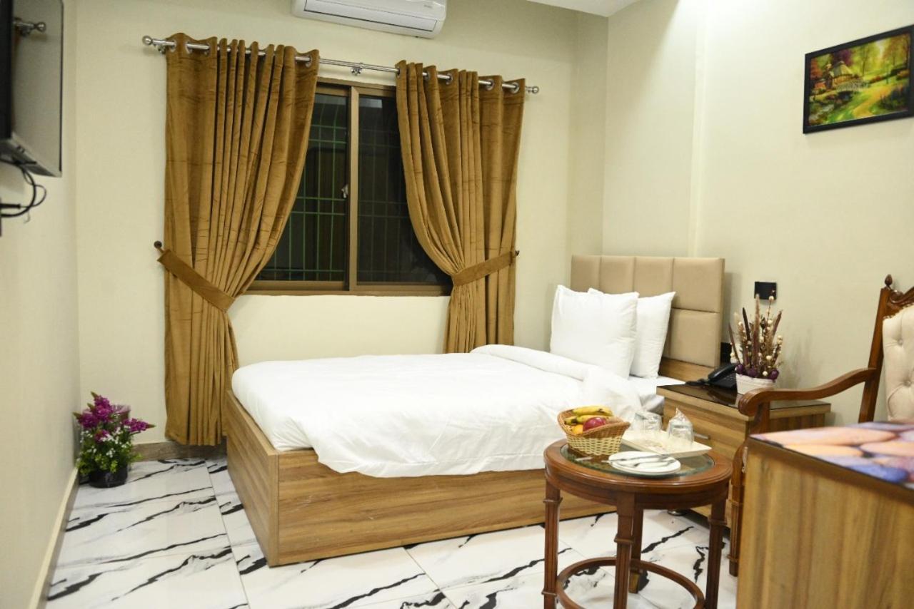 Hotel Pearl Inn Karachi Exteriör bild