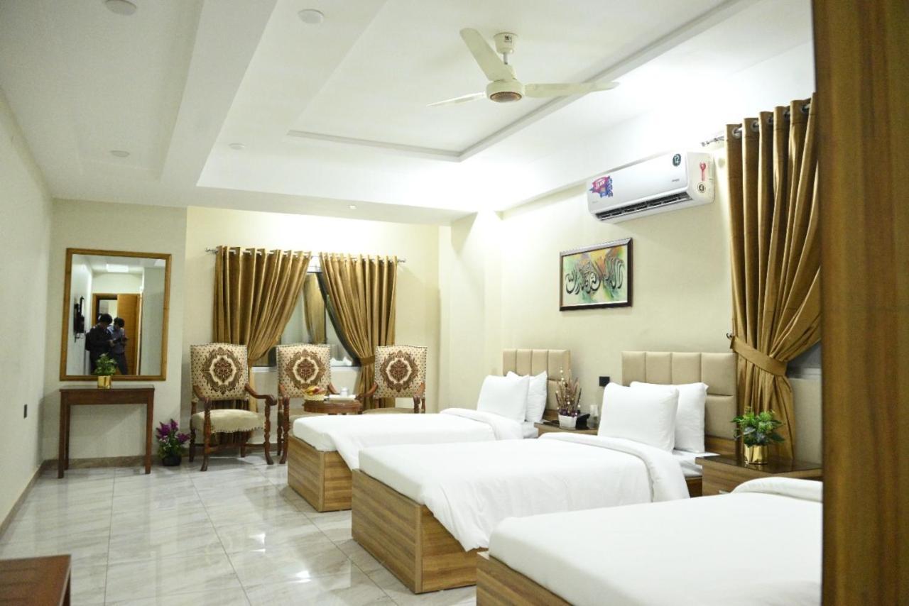 Hotel Pearl Inn Karachi Exteriör bild