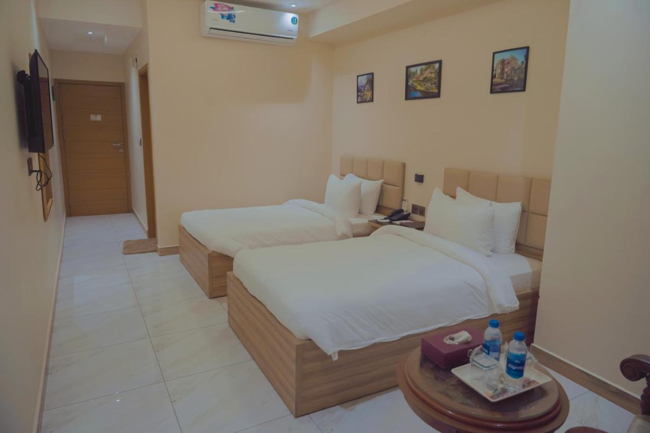 Hotel Pearl Inn Karachi Exteriör bild